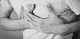 Heart-Healthy Herbs and Spices A picture of a man holding his left chest region