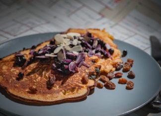 Dried Fruits and their Health Benefits A picture of raisins in a plate