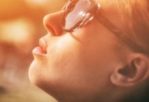 Melanoma: Symptoms, Causes, and Treatment an adult looking up