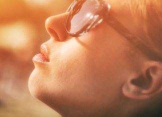 Melanoma: Symptoms, Causes, and Treatment an adult looking up