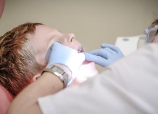 Uvulitis: Causes, Symptoms, and Treatment The picture of a dentist