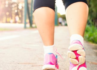 21 Health Benefits of Morning Walks a person walking