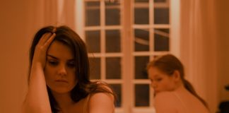 Heart Attack in Women: Symptoms & Treatments sad woman
