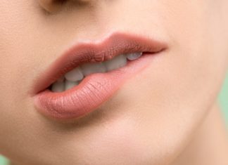 6 Home Remedies to Cure White Spots on Lips woman`s lips