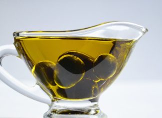 9 Health Benefits of Oregano Oil a cup of olive oil