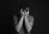 Know Your Mental Health A man with his head in his hands