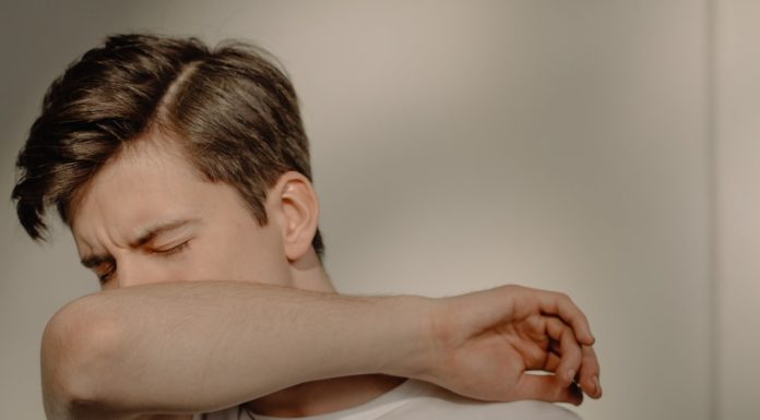 Sinus; Causes, Prevention, and Treatment man sneezing