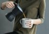 11 Health Risks of Skipping Breakfast coffee in a cup