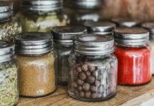 Remarkable Health Benefits of Spices and Herb herbs in bottles