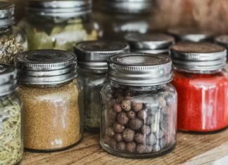 Remarkable Health Benefits of Spices and Herb herbs in bottles